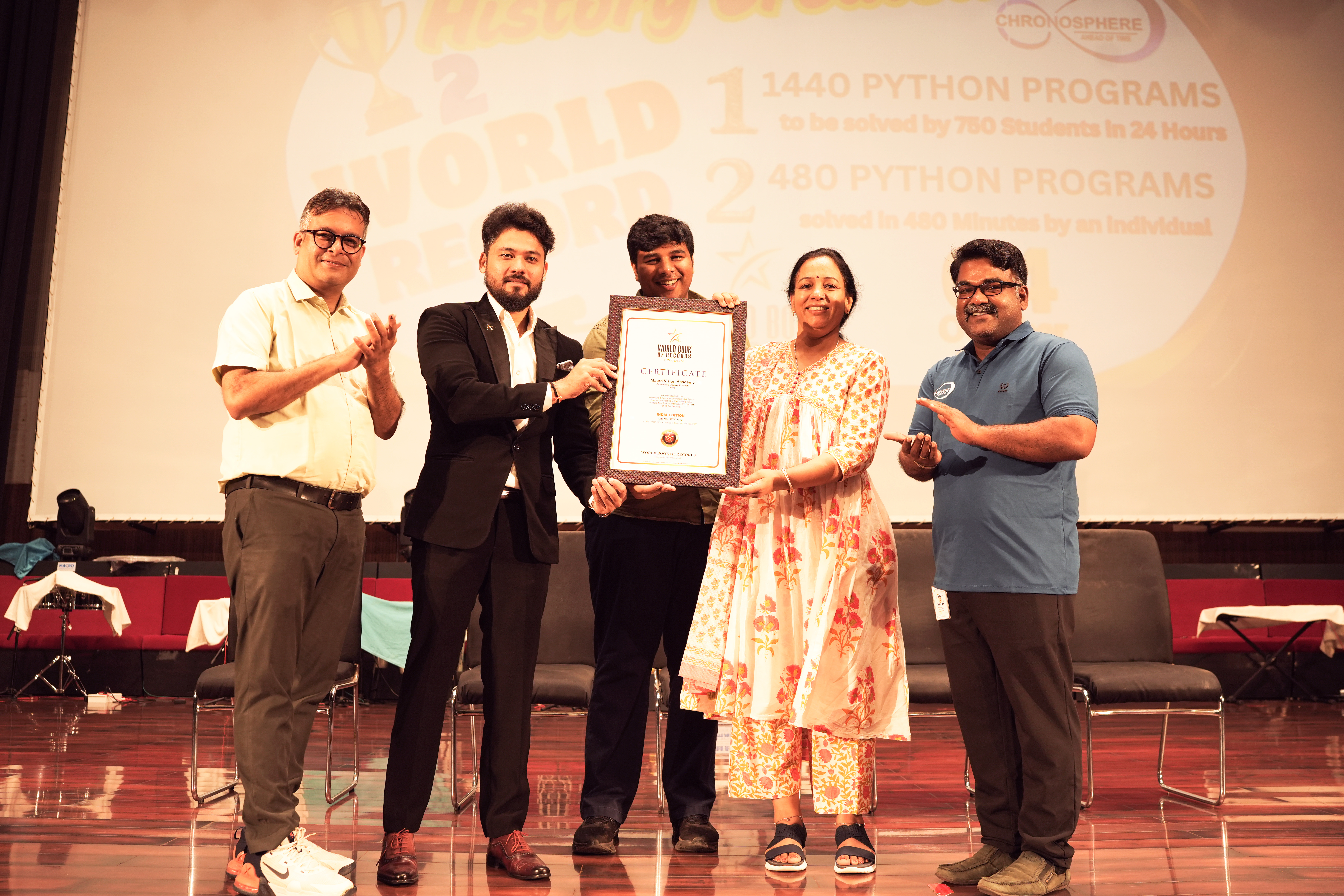 Macro Vision Academy, Burhanpur, has made history by securing a place in World Book of Records with two remarkable achievements in Python programming, showcasing the institution’s innovative spirit and dedication to excellence in education. In an extraordinary 24-hour coding marathon, 750 students successfully solved 1,440 Python programs from 7 AM on 3rd October 2025 to 7 AM on 4th October 2025. Continuing the momentum, the academy achieved another milestone the very next day, when 750 individuals completed 480 Python programs in 480 minutes setting a second world record for collective programming excellence.